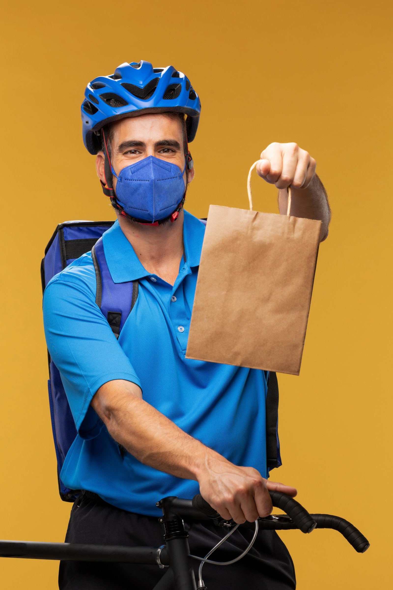 portrait-delivery-man-handing-out-parcel-11zon